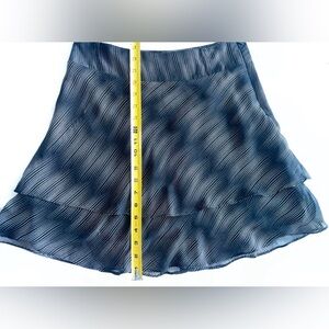 IO
Semi-Sheer fully lined full skirt